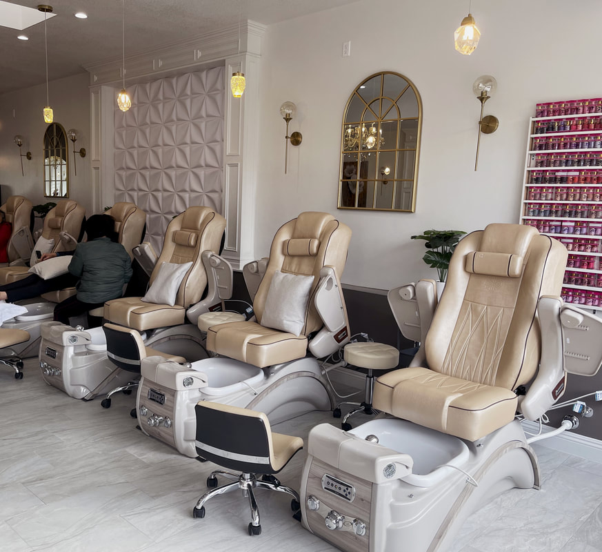 several salon chairs in a nail salon